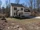 Charming two-story home featuring a paved driveway and a well-maintained front lawn at 2218 Christian Light Rd, Fuquay Varina, NC 27526