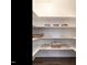 Organized pantry shelves with ample storage space for kitchen essentials at 2218 Christian Light Rd, Fuquay Varina, NC 27526