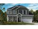 Inviting two-story home featuring a classic facade, attached garage, and nicely landscaped front yard at 253 Tidal Pool Way, Cary, NC 27519