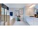 Modern bathroom featuring a walk-in shower, soaking tub, double vanity and decorative accents at 253 Tidal Pool Way, Cary, NC 27519