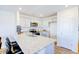 Bright kitchen features granite countertops, stainless steel appliances, and breakfast bar seating at 309 Cherry Laurel Dr, Sanford, NC 27332