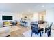Open-concept living space combines a dining area, kitchen with island, and a comfortable living area at 309 Cherry Laurel Dr, Sanford, NC 27332