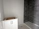 Bathroom with a new shower featuring gray tiling and a niche at 3287 Roundly Rd # 13, New Hill, NC 27562