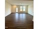 Spacious living room with hardwood floors, recessed lighting, and a glass door to the yard at 343 Church St # 66, Wendell, NC 27591