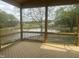 Screened porch overlooking backyard pond and wooded area at 395 Meadow Walk Dr, Fuquay Varina, NC 27526