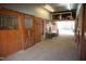 Well-lit barn interior with clean stalls and ample storage space at 4100 Durham Rd, Raleigh, NC 27614