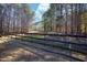 Exterior fencing on property highlighting equestrian potential at 4100 Durham Rd, Raleigh, NC 27614