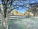 View of exterior fencing on property highlighting equestrian potential at 4100 Durham Rd, Raleigh, NC 27614