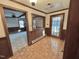 Inviting foyer with wood accents and natural light at 4100 Durham Rd, Raleigh, NC 27614