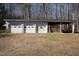 Featuring a spacious garage and barn structure, perfect for storage and livestock at 4100 Durham Rd, Raleigh, NC 27614
