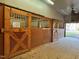 Interior view of the barn displaying well-maintained horse stalls at 4100 Durham Rd, Raleigh, NC 27614