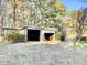 Outbuilding featuring convenient garage door access at 4100 Durham Rd, Raleigh, NC 27614