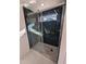 Modern shower featuring stylish tile, glass door, and rainfall shower head for a luxurious bathing experience at 518 Worth St, Raleigh, NC 27601