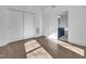 Spacious bedroom with hardwood floors, ample natural light, and ensuite bathroom access at 518 Worth St, Raleigh, NC 27601