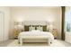 Comfortable bedroom featuring stylish modern furnishings, natural light, and neutral color palette at 532 Morning Light Dr, Angier, NC 27501