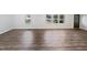 Spacious living room with hardwood floors and lots of natural light at 6423 Whitt Rd, Durham, NC 27712