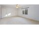 Bright bedroom with a ceiling fan, a double window and a double-door closet at 69 Holly Tree Dr, Timberlake, NC 27583