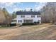 Two-story home with a screened in porch and large front yard at 69 Holly Tree Dr, Timberlake, NC 27583