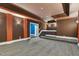 Basement with two-tone paint, accent lighting, and stairway to a raised platform at 1013 Timber Mist Ct, Cary, NC 27519