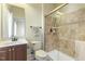 Nicely decorated bathroom features a framed shower with glass doors, a granite sink, and a towel rack at 1013 Timber Mist Ct, Cary, NC 27519