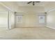 This large bedroom features carpet, two windows, crown molding and plenty of space at 1013 Timber Mist Ct, Cary, NC 27519