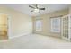 Bright bedroom with neutral walls and a large window, offering a serene and inviting atmosphere at 1013 Timber Mist Ct, Cary, NC 27519