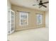 Bedroom featuring light carpet, neutral walls, and ceiling fan at 1013 Timber Mist Ct, Cary, NC 27519