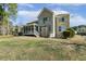 Charming brick home featuring screened porch, perfect for outdoor entertaining at 1013 Timber Mist Ct, Cary, NC 27519