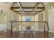 Elegant foyer with wood flooring and a detailed coffered ceiling leads to the main living spaces at 1013 Timber Mist Ct, Cary, NC 27519