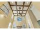 View looking up to see a decorative ceiling and living room windows at 1013 Timber Mist Ct, Cary, NC 27519