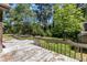 Spacious back deck overlooks a lush, green backyard with mature trees, great for outdoor entertaining at 1031 Wait Ave, Wake Forest, NC 27587