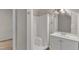 Bright bathroom with a walk-in shower and vanity with storage, perfect for a relaxing experience at 1031 Wait Ave, Wake Forest, NC 27587
