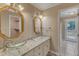 This bathroom features glass vessel sinks and granite countertops at 1031 Wait Ave, Wake Forest, NC 27587