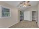 Bright bedroom with a fan and exterior access to the outside at 1031 Wait Ave, Wake Forest, NC 27587