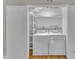Practical laundry area with modern washer and dryer, and storage shelving for convenience at 1031 Wait Ave, Wake Forest, NC 27587