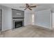 This living room features a fireplace and ceiling fan at 1031 Wait Ave, Wake Forest, NC 27587