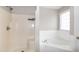 Bathroom featuring shower and bathtub with tile surround at 104 Eddy Ct, Benson, NC 27504