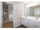 En-suite bathroom featuring double sink vanity and large bathtub at 104 Eddy Ct, Benson, NC 27504