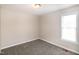 Neutral bedroom with carpet flooring, natural light, and neutral walls at 104 Eddy Ct, Benson, NC 27504