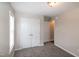 Neutral bedroom features a closet with doors and a window for natural light at 104 Eddy Ct, Benson, NC 27504