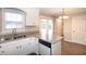 Open kitchen featuring granite countertops, stainless appliances and dining area at 104 Eddy Ct, Benson, NC 27504
