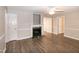 Spacious living room with laminate flooring, neutral paint, and natural light at 104 Eddy Ct, Benson, NC 27504