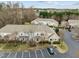 Aerial view of townhome exteriors, showcasing parking, landscaping, and a well-maintained community, great for visibility at 11425 Shadow Elms Ln, Raleigh, NC 27614