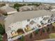 A row of townhomes with private, fenced back patios offers outdoor living space at 11425 Shadow Elms Ln, Raleigh, NC 27614