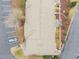 An aerial view of a townhouse roof with asphalt shingles and nearby parking at 11425 Shadow Elms Ln, Raleigh, NC 27614