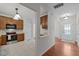 Charming kitchen featuring wooden cabinets, modern appliances, and bright neutral countertops at 11425 Shadow Elms Ln, Raleigh, NC 27614