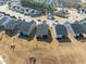 Aerial view of a modern residential neighborhood featuring well-maintained homes and landscaping at 1255 White Flint Cir, Durham, NC 27703