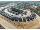 Bird's-eye view of a well-planned community featuring modern homes and ample green spaces at 1255 White Flint Cir, Durham, NC 27703