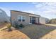 Nice backyard featuring a screened patio with chairs, a well-maintained lawn and landscaping at 1255 White Flint Cir, Durham, NC 27703