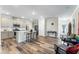 This kitchen is equipped with a central island and modern appliances with seating facing into the kitchen at 1255 White Flint Cir, Durham, NC 27703
